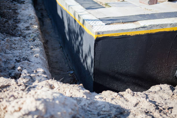 Professional Waterproofing technician working in Marietta, OH